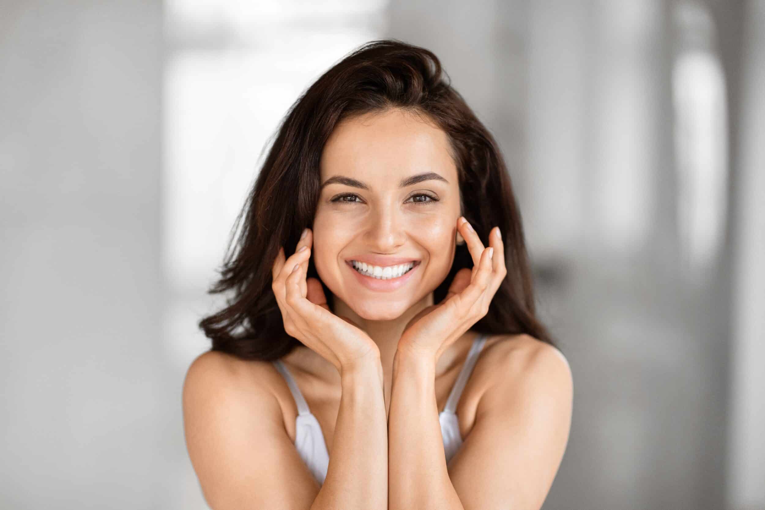 shutterstock 2453275621 Woman with glowing skin thanks to cosmetic dermatology